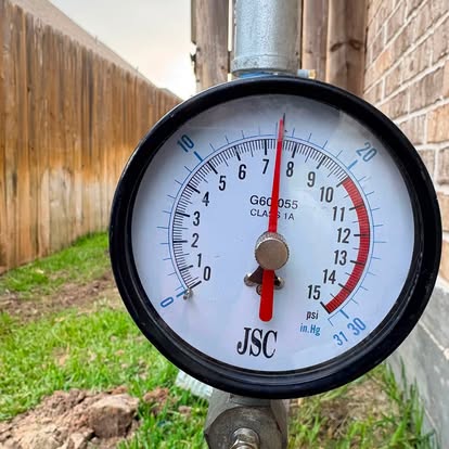 Pressure gauge testing a newly installed plumbing line