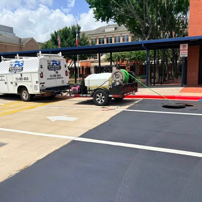 Kilgore Plumbing Group service truck and jetting equipment on a commercial job