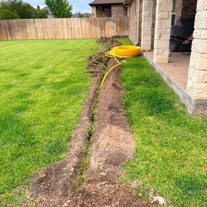 New underground line installed beside a Houston-area home