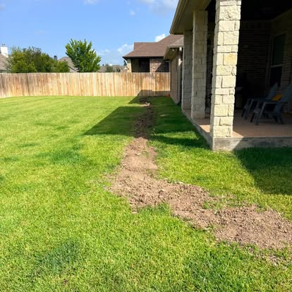 Neatly restored yard after underground plumbing work